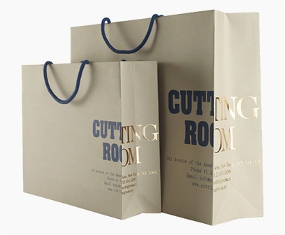 luxury paper bag with the gold foil stamped logo